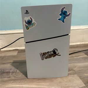 Sony Gray Console with Character Stickers